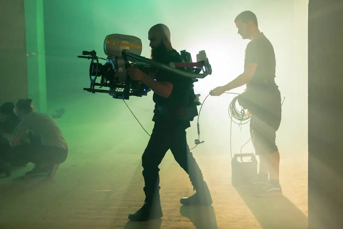 Operator wearing a support exoskeleton