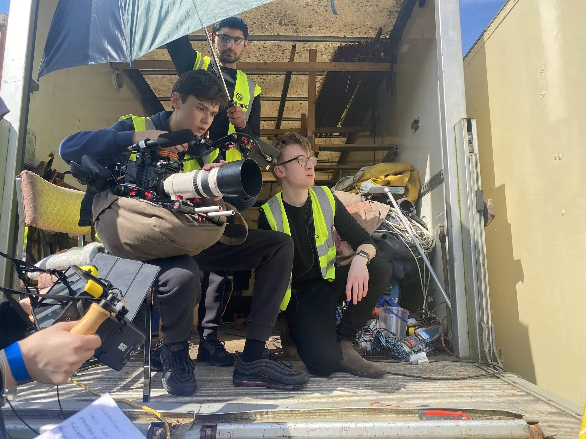 Crew working in the back of a truck